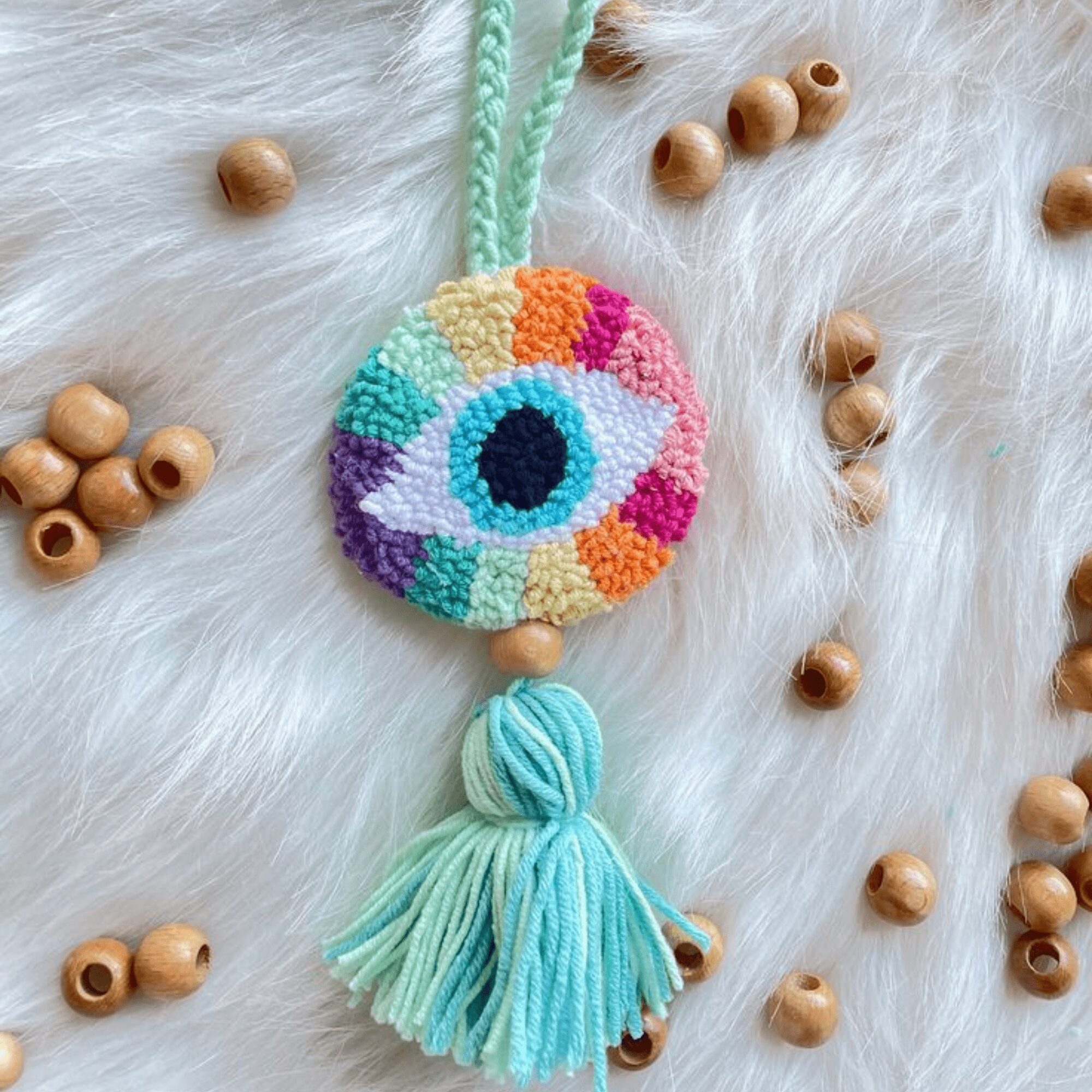 Evil Eye Punch Needle Charm – Handmade, Colorful & Eco-Friendly Wall or Bag Accessory