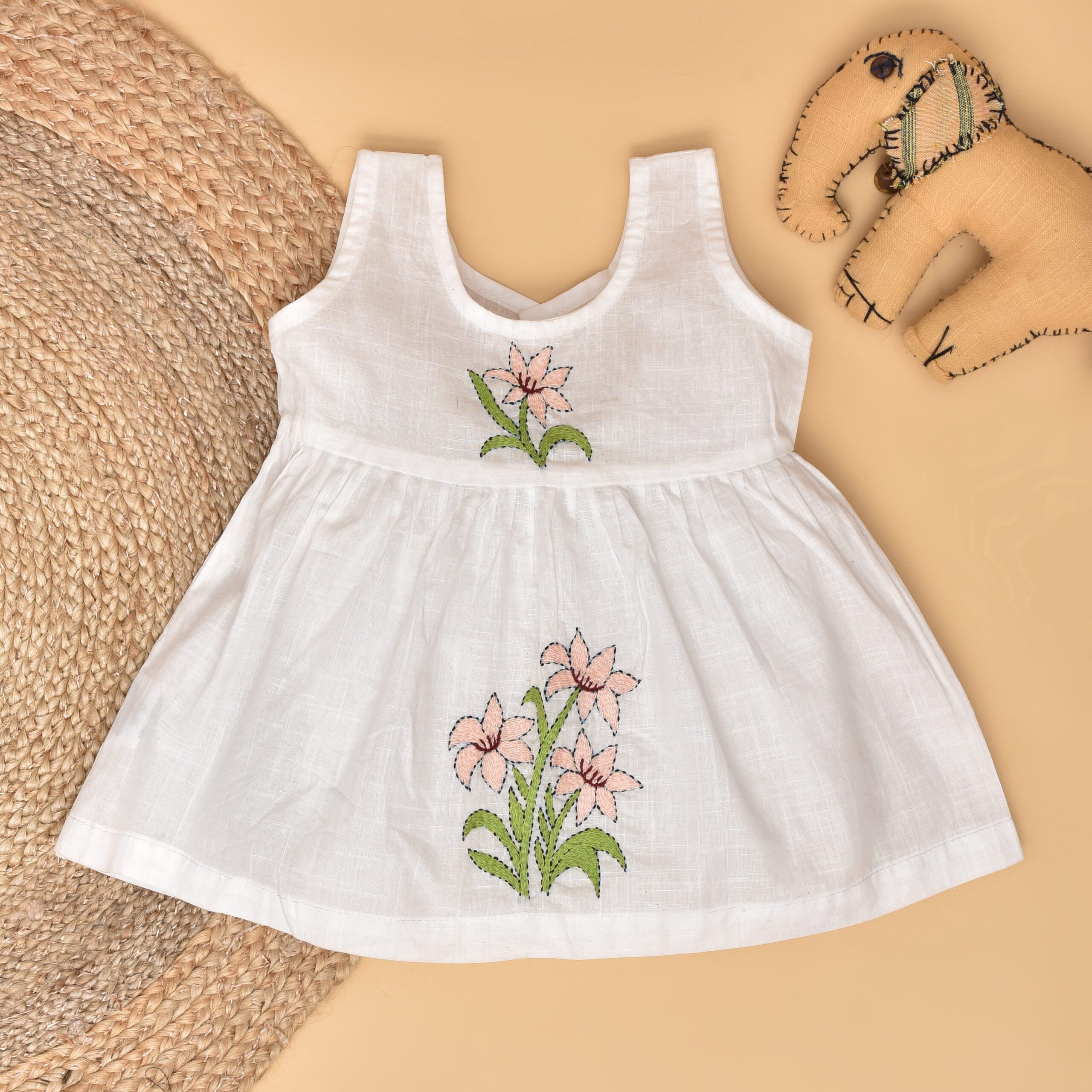 White Cotton Baby Dress with Lily Design Hand Embroidery