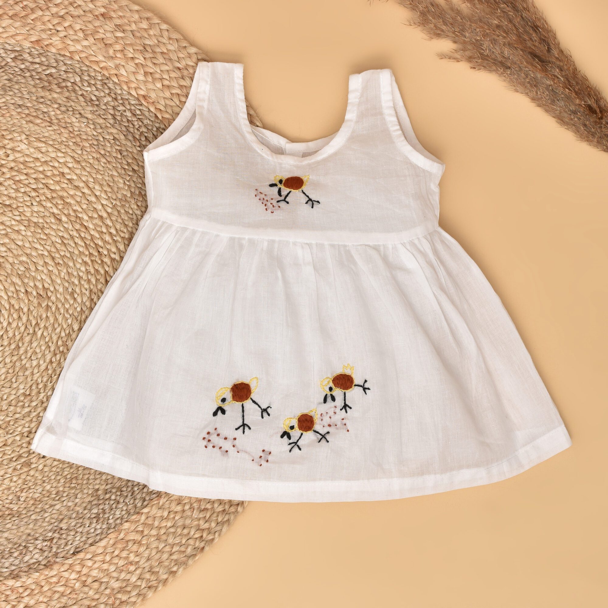 White Mulmul Baby Dress with Hen Design Hand Embroidery